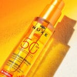 NUXE - Huile Solaire Bronzante Haute Protection SPF50 visage et corps - 150ml – Image 7